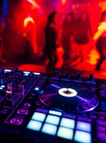 professional_dj_mixer_controller_mixing_music_nightclub
